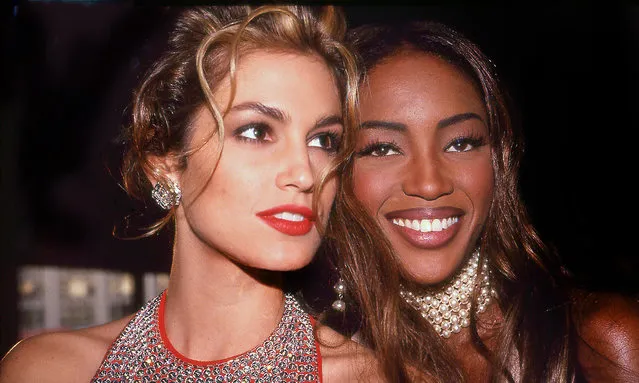 Models Cindy Crawford and Naomi Campbell attend a private party in New York City, New York, 1992. (Photo by Rose Hartman/Getty Images)