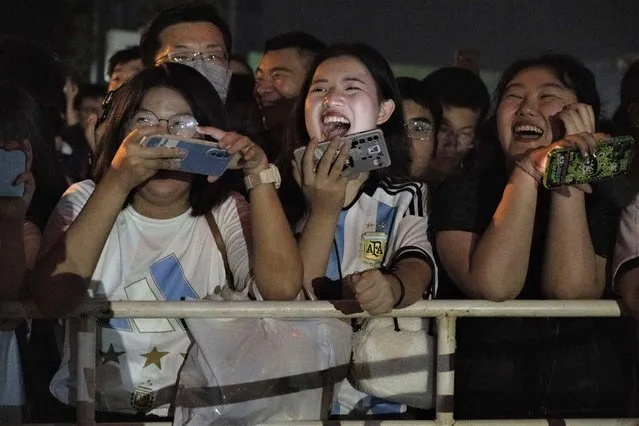Chinese fans wait to catch a glimpse of Lionel Messi when he departs with the Argentina team after practice at the Worker's Stadium in Beijing, Wednesday, June 14, 2023. Argentina is scheduled to play Australia in a friendly match in China's capital on Thursday. (Photo by Ng Han Guan/AP Photo)