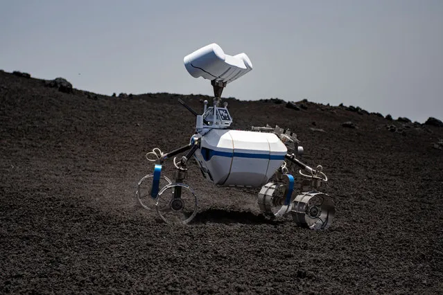 A remotely controlled robot is tested on Mount Etna for future space exploration by scientists from the European Space Agency (ESA) and the German Aerospace Center on Mount Etna, Italy June 23, 2022. Picture taken June 23, 2022. (Photo by Giuseppe Di Stefano – Etna Walk/Handout via Reuters)