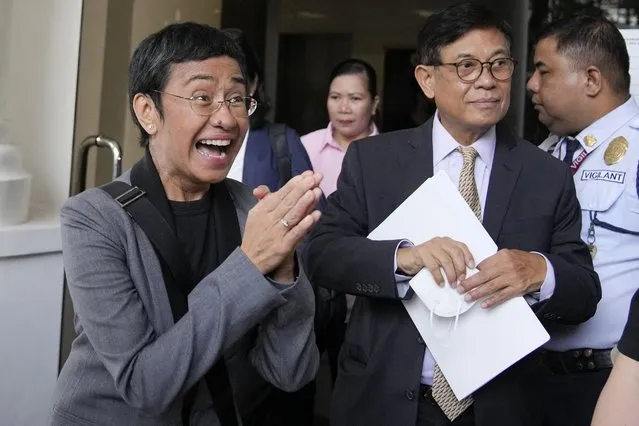 Filipino journalist Maria Ressa, 2021 Nobel Peace Prize winner and Rappler CEO, gestures as she faces reporters after being acquitted by the Pasig Regional Trial Court over a tax evasion case in Pasig city, Philippines on Tuesday, September 12, 2023. (Photo by Aaron Favila/AP Photo)