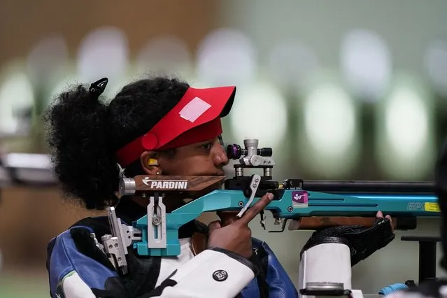 Luna Solomon, of Refugee Olympic Team, competes in the women's 10-meter air rifle at the Asaka Shooting Range in the 2020 Summer Olympics, Saturday, July 24, 2021, in Tokyo, Japan. (Photo by Alex Brandon/AP Photo)