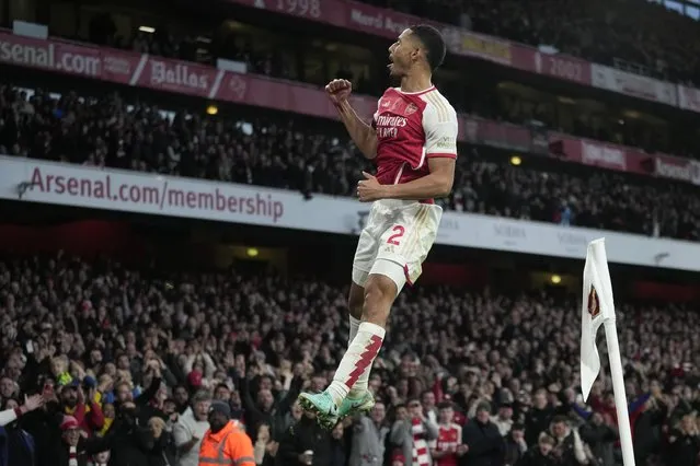 Arsenal's William Saliba celebrates scoring his side's 2nd goal during the English Premier League soccer match between Arsenal and Burnley at Emirates stadium in London, England, Saturday, November 11, 2023. Arsenal won 3-1. (Photo by Kin Cheung/AP Photo)