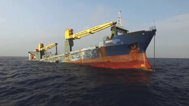 In this January 20, 2017 photo provided by the Texas Parks and Wildlife Department, a former cargo vessel named Kraken sinks more than 60 miles off the coast of Galveston, Texas, to become an artificial reef. The ship is expected to become a home to fish, coral and other invertebrates plus being a destination for divers. (Photo by Texas Parks and Wildlife Department via AP Photo)