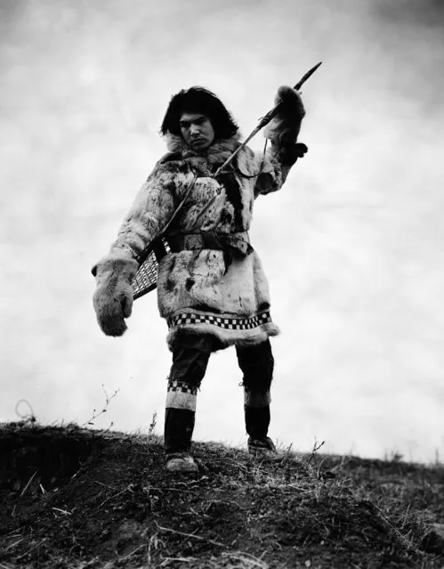 Eskimo with spear. Still from early documentary “Igloo” directed by Ewing Scott, 1932. (Photo by Bettmann Collection)