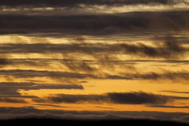 Clouds float across the Pacific Ocean after sunset in Encinitas, California January 19, 2016. (Photo by Mike Blake/Reuters)