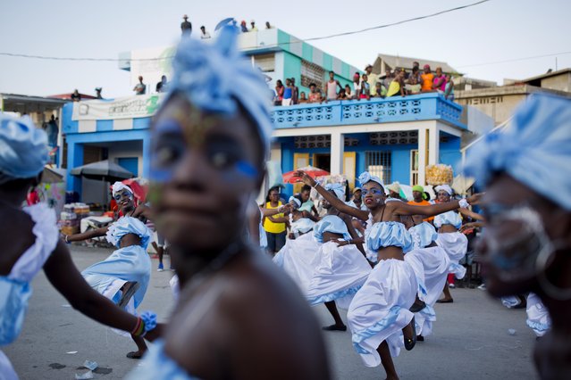 Dancers perform in the Carnival parade in Les Cayes, Haiti, Monday, February 27, 2017. (Photo by Dieu Nalio Chery/AP Photo)