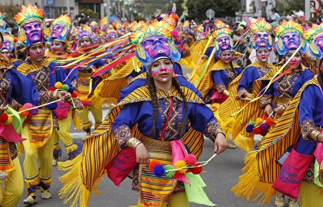 People wearing costumes participate in the parade of the choreographic groups in tribute to Mother Earth during the Carnival of Blacks and Whites (Carnaval de Negros y Blancos) in Pasto, Colombia, 03 January 2023. (Photo by Mauricio Duenas Castaneda/EPA/EFE/Rex Features/Shutterstock)