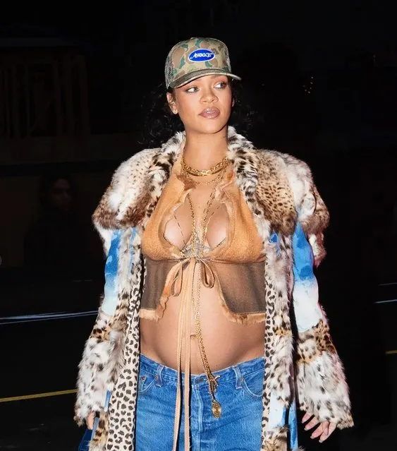Pregnant Rihanna unleashes her wild side as she drapes her growing baby bump in fur coat for dinner in Los Angeles on February 9, 2022. (Photo by Rex Features/Shutterstock)