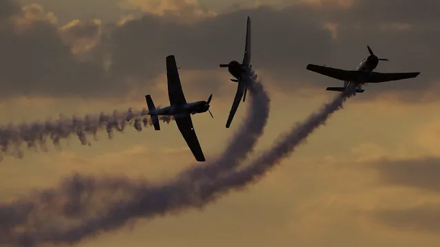 Vintage World War II-era aircraft perform aerobatics during a performance at the Australian International Airshow 2019 at Avalon, some 50 kilometres west of Melbourne, on March 1, 2019. (Photo by William West/AFP Photo)