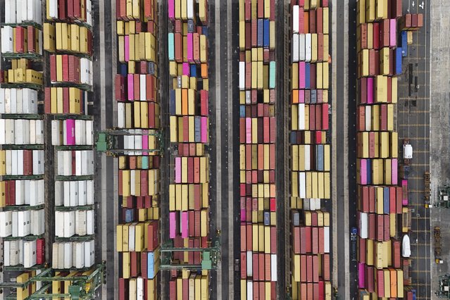 Cranes load and unload containers from cargo ships at Rodman Port, after Panama Canal authorities reported they will increase vessel transits through the interoceanic waterway following drought-related restrictions, in Panama City, June 13, 2024. (Phoot by Matias Delacroix/AP Photo)