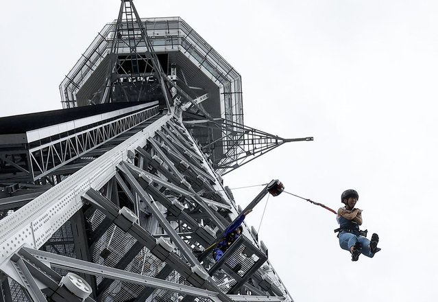 A “Dive and Walk” attraction begins at Osaka's landmark Tsutenkaku Tower on July 1, 2024. (Photo by Kyodo News)