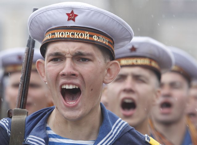 Re-enactors, in World War Two-era Soviet Navy uniforms, take part in the Victory Day military parade, marking the 72nd anniversary of the victory over Nazi Germany in World War Two, in the southern city of Stavropol, Russia, May 9, 2017. (Photo by Eduard Korniyenko/Reuters)