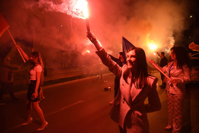 Supporters of Jakov Milatovic celebrate after the early results of the second round of the presidential elections in Podgorica, Montenegro, 02 April 2023. Early election results are suggesting that Jakov Milatovic has won the presidential runoff election in Montenegro. (Photo by Boris Pejovic/EPA)