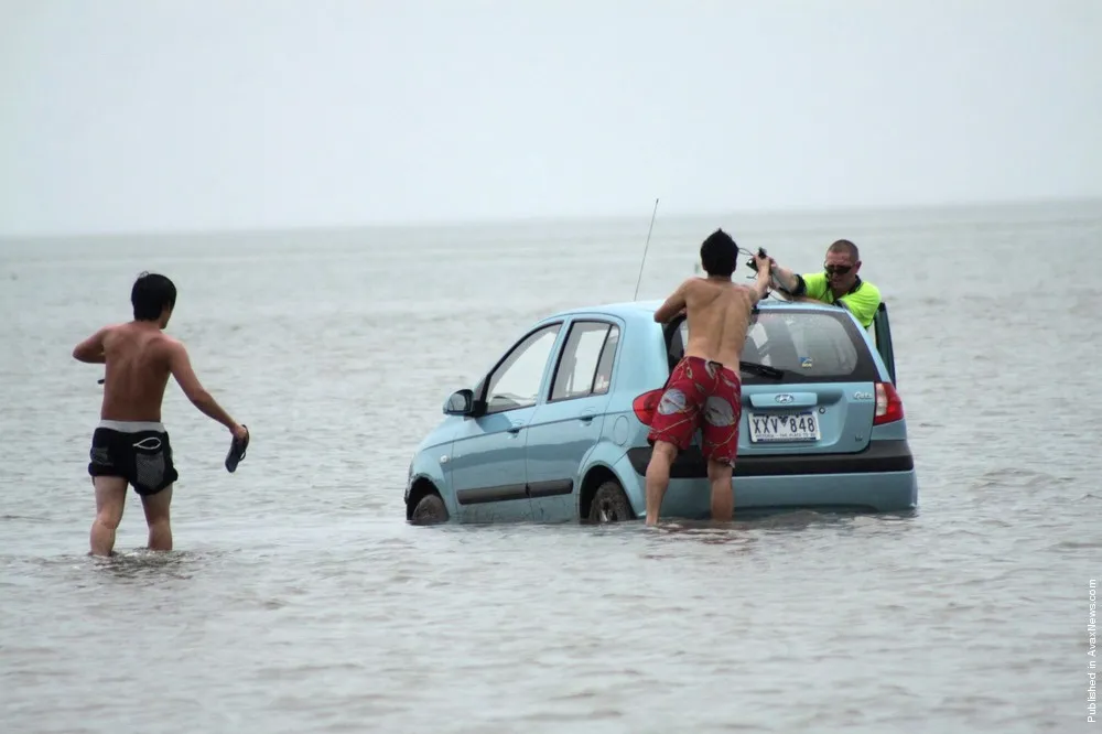Misguided Tourists Drive Into Ocean