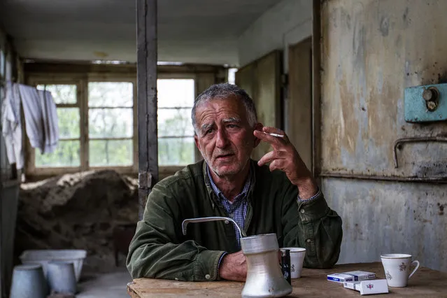 “The Village Doctor”. After a long day of walking in the mountains of the region Lorri, I am welcomed by the village doctor of Aygehat. Interested in the profession of photographer, it prompts me to drink coffee in his house. I decided to mark this moment. Photo location: Aygehat, Lorri Region, Armenia. (Photo and caption by Virab Mouradian/National Geographic Photo Contest)