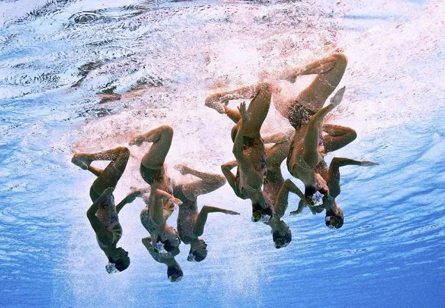 Members of Team Italy are seen underwater as they perform in the synchronised swimming team free routine preliminary at the Aquatics World Championships in Kazan, Russia July 28, 2015. (Photo by Michael Dalder/Reuters)