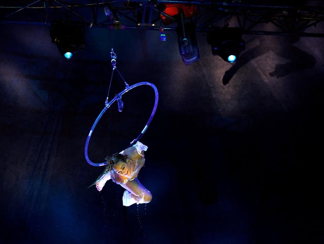 Laura Miller is pictured during her aquatic performance at the photocall for Circus Extreme in Leeds, Britain on June 14, 2023. (Photo by Lee Smith/Reuters)