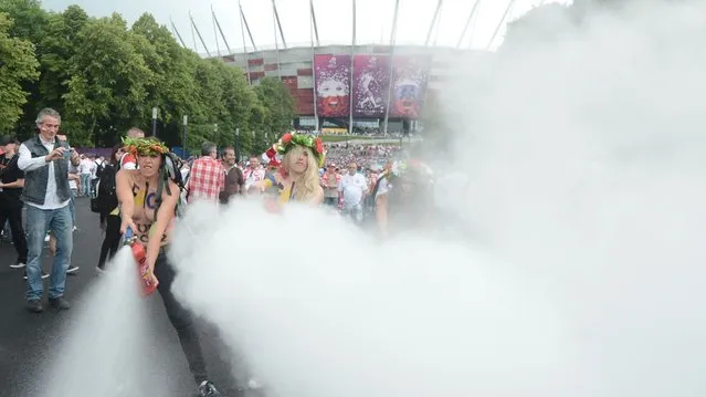 FEMEN Activists Strip In Protest Against EURO 2012