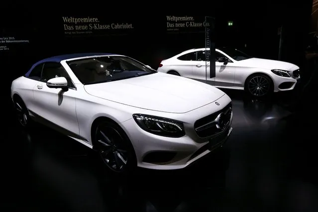 A new Mercedes-Benz S-Class S500 (L) convertible car is pictured at the booth of Mercedes-Benz during the media day at the Frankfurt Motor Show (IAA) in Frankfurt, Germany, September 14, 2015. The new Mercedes C-class coupe is seen at right. (Photo by Ralph Orlowski/Reuters)