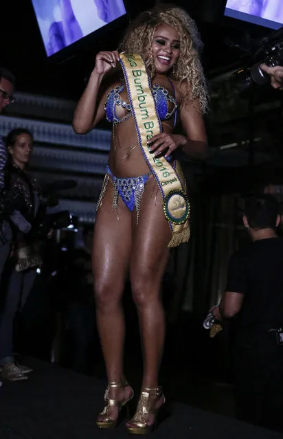 Erika Canela from Bahia smiles after winning the Miss Bumbum Brazil 2015 pageant in Sao Paulo, Brazil on November 9, 2016. Fifteen candidates compete in the annual pageant to select Brazil's sexiest female rear end. (Photo by Miguel Schincariol/AFP Photo)