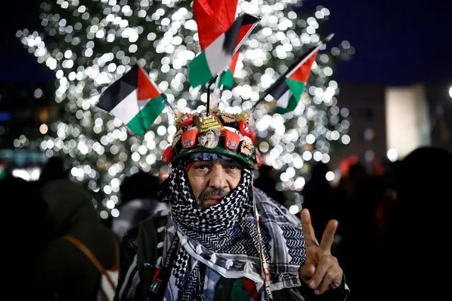 A protester reacts during the demonstration outside the U.S. embassy against President Donald Trump's decision to recognise Jerusalem as Israel's capital in Berlin, Germany December 8, 2017. (Photo by Axel Schmidt/Reuters)
