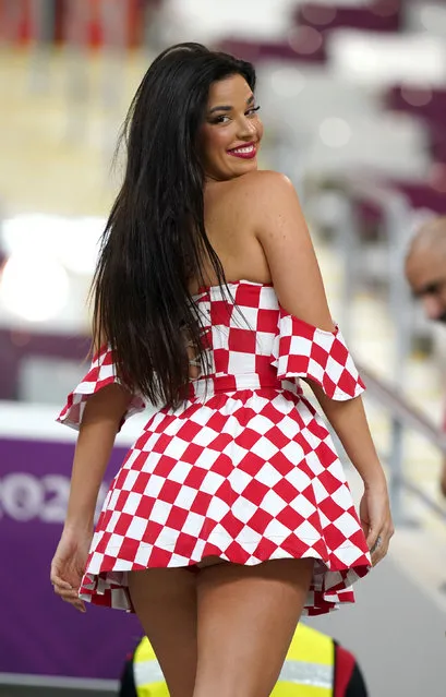Ivana Knoll, Croatia fan and model who has been pushing the modesty dress code of Qatar and causing a stir online is seen in the stands before the FIFA World Cup Group F match at the Khalifa International Stadium, Doha, Qatar on Sunday, November 27, 2022. (Photo by Davy/PA Wire Press Association)