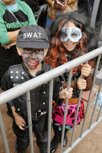 Fans seen at Columbia Pictures and Sony Pictures Animation World Premiere of “Goosebumps” at Regency Village Theatre on Sunday, October 4, 2015, in Westwood, CA. (Photo by Eric Charbonneau/Invision for Sony Pictures/AP Images)