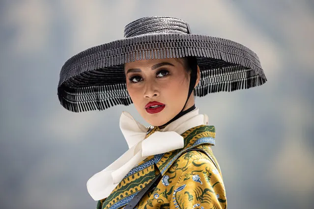 A model showcases designs by Denny Wirawan during the East Java Fashion Harmony show at Segara Wedi Batok Mount Bromo on December 03, 2022 in Probolinggo, Java, Indonesia. (Photo by Robertus Pudyanto/Getty Images)