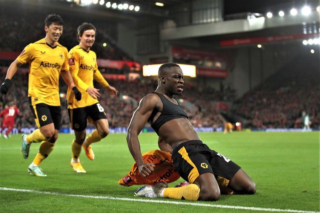 Toti Gomes of Wolverhampton Wanderers celebrates after scoring the team's third goal which is later disallowed for offside by VAR during the Emirates FA Cup Third Round match between Liverpool FC and Wolverhampton Wanderers at Anfield on January 07, 2023 in Liverpool, England. (Photo by Jack Thomas - WWFC/Wolves via Getty Images)