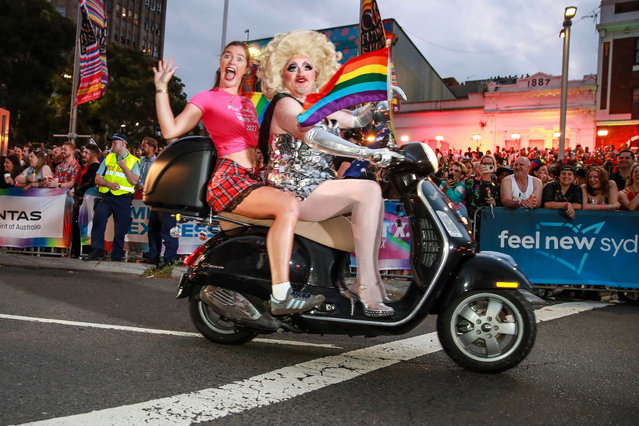 Participants take part in the Sydney Gay & Lesbian Mardi Gras Parade on March 02, 2024 in Sydney, Australia. The Sydney Gay and Lesbian Mardi Gras parade began in 1978 as a march to commemorate the 1969 Stonewall Riots in New York and has been held every year since to promote awareness of gay, lesbian, bisexual and transgender issues. (Photo by Roni Bintang/Getty Images)