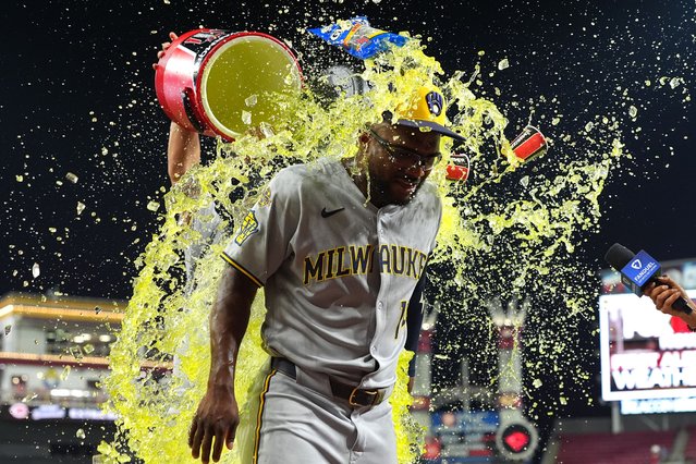 Andruw Monasterio #14 of the Milwaukee Brewers doused with liquid after the game against the Cincinnati Reds at Great American Ball Park on August 16, 2025 in Cincinnati, Ohio. Milwaukee Brewers won 6-5. (Photo by Jason Mowry/Getty Images)