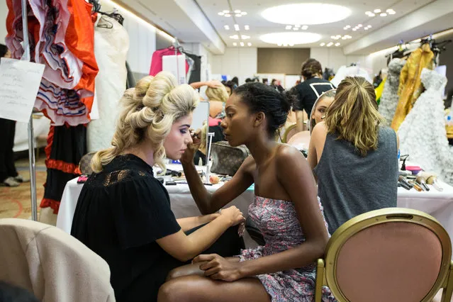Miss International contestants get their hair and makeup done prior to the start of the Miss International Beauty Pageant 2015 at the Grand Prince Hotel Shintakanawa on November 5, 2015 in Tokyo, Japan. (Photo by Christopher Jue/Getty Images)