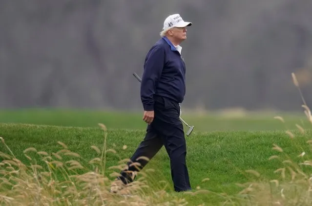 U.S. President Donald Trump plays golf at the Trump National Golf Club in Sterling, Virginia, U.S., November 15, 2020. (Photo by Joshua Roberts/Reuters)