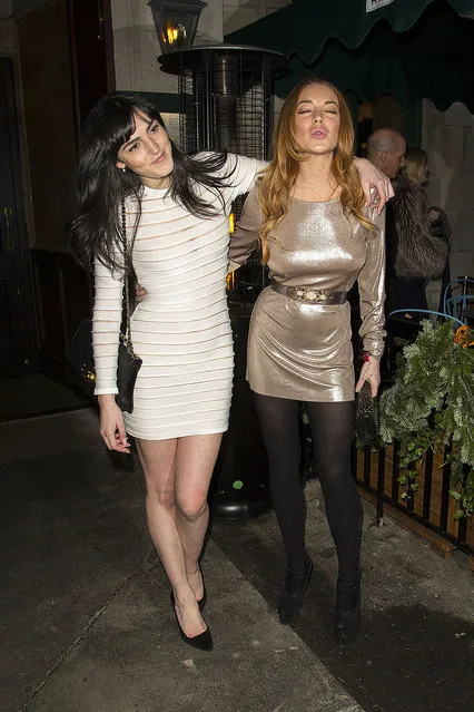 Lindsay Lohan and Ali Lohan at Love Magazine Christmas Party at The Ivy Market Grill in Covent Garden in London. London, United Kingdom – Monday December 15, 2014. (Photo by Ringo/PacificCoastNews)