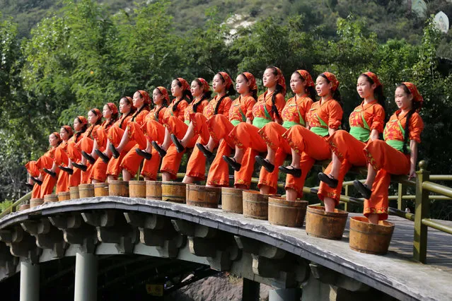 Women perform on a Shaolin Zen Music Ritual in Dengfeng, Henan province, China September 29, 2016. (Photo by Reuters/Stringer)