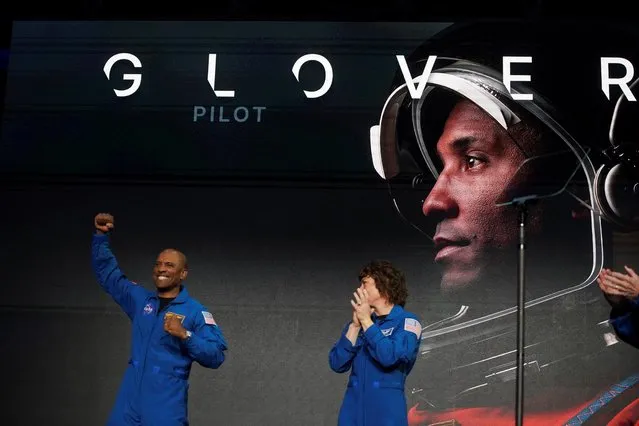 Astronauts Victor Glover and Christina Koch, crew members of the Artemis II space mission to the moon and back, react at an NASA event in Houston, Texas, U.S., April 3, 2023. (Photo by Go Nakamura/Reuters)