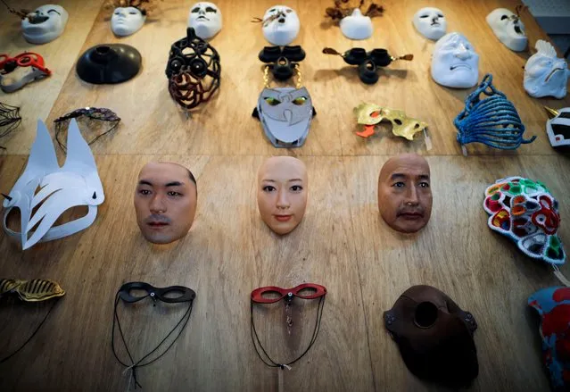 Masks based on real people's faces are diplayed at the Shuhei Okawara's mask shop Kamenya Omote in Tokyo, Japan on December 16, 2020. (Photo by Issei Kato/Reuters)