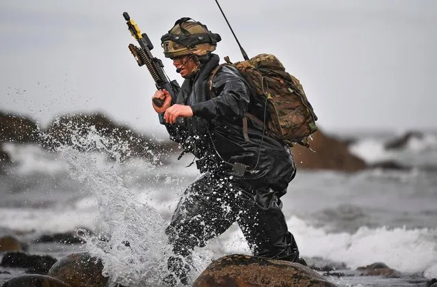 Royal Marines come ashore as they take part in Exercise Joint Warrior on April 26, 2018 in Dundrennan,Scotland. The exercise is involving some 11,600 military personnel from seventeen nations, in one of the largest exercises of its kind in Europe, operating out of Her Majesty's Naval Base Clyde. The bi-annual exercise is running from the 21st April to 4th May and incorporates all three UK services as well as forces from 16 other nations including Denmark, Estonia, Latvia, Lithuania, the Netherlands, Spain, Sweden, and the US. (Photo by Jeff J. Mitchell/Getty Images)