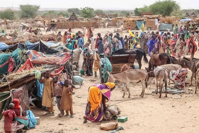 Sudanese refugees from the Tandelti area who crossed into Chad, in Koufroun, near Echbara, are seen on April 30, 2023. (Photo by Gueipeur Denis Sassou/AFP Photo)
