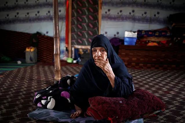 An indiginous Sahrawi woman sits inside her tent in Tifariti, Western Sahara, September 8, 2016. (Photo by Zohra Bensemra/Reuters)