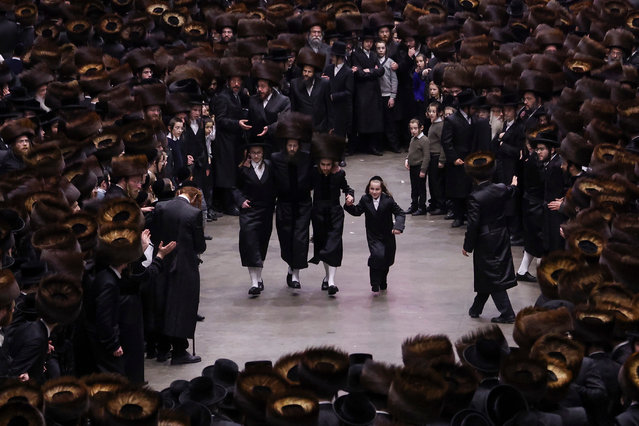 Men and boys dance inside the Duggal Greenhouse Complex to celebrate the marriage of the great-granddaughter of Grand Rabbi Aron Teitelbaum in the Brooklyn borough of New York, New York, USA, 04 December 2025. (Photo by Sarah Yenesel/EPA)
