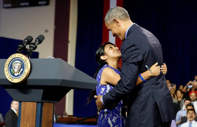 U.S. President Barack Obama hugs Cyntia Paytan after she introduced Obama to speak at a town hall meeting with young leaders at Pontifical Catholic University of Peru in Lima November 19, 2016. (Photo by Kevin Lamarque/Reuters)