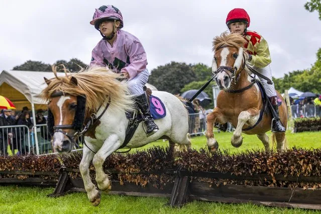 Young jockeys race on Shetland ponies at the Aldborough & Boroughbridge Show at Newby Hall in North Yorkshire, United Kingdom on July 23, 2023. (Photo by James Glossop/The Times)