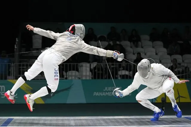 Andrew Doddo of the United States, left, faces Canada's Shaul Gordon during a men's fencing sabre individual semifinal match at the Pan American Games in Santiago, Chile, Wednesday, November 1, 2023. (Photo by Eduardo Verdugo/AP Photo)