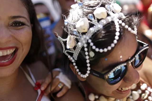 Revellers smile during an annual block party known as “Enquanto isso na Sala da Justiça” (Meanwhile, in the justice room), one of the many carnival parties taking place in the neighbourhood of Olinda, Brazil February 7, 2016. (Photo by Ueslei Marcelino/Reuters)