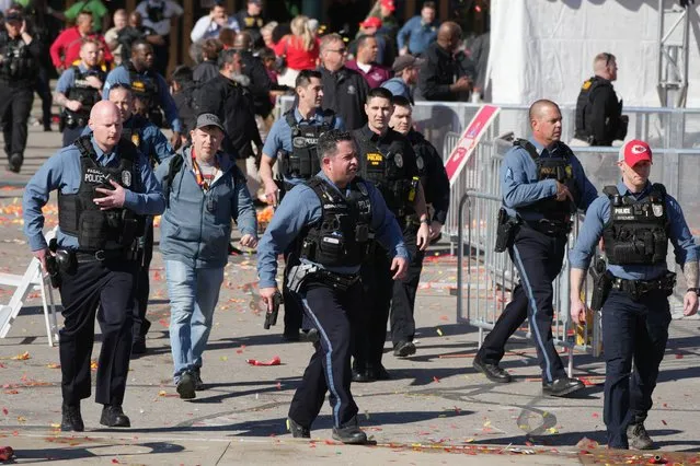 Police respond after gun shots were fired following the Kansas City Chiefs Super Bowl parade, Kansas City, Missouri, on February 14, 2024. (Photo by Kirby Lee/USA TODAY Sports)