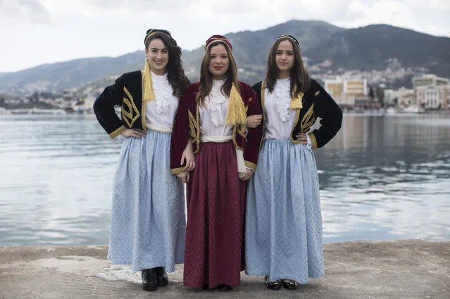 School children wearing traditional island dress pose as they wait for the Independence Day parade on March 25, 2016 in Mytilene, Greece. The annual parade marks the anniversary of Greek independence from Turkish rule in 1821, and is attended my School children from across the Island and military personnel. (Photo by Dan Kitwood/Getty Images)