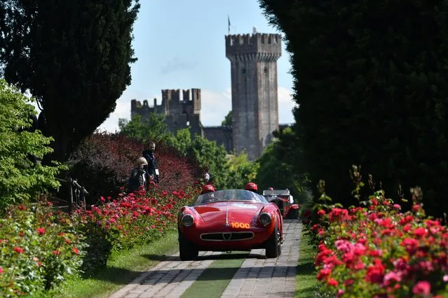 Competitors in classic cars compete in the 1000 MIGLIA 2019 Day One on May 15, 2019 in Brescia, Italy. The 1000 Miglia is an annual re-enactment of the original Mille Miglia (Thousand Miles), an open-road endurance race that ran between 1927 and 1957. (Photo by Massimo Bettiol/Getty Images)
