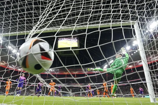 Netherlands' goalkeeper Bart Verbruggen fails to make a save during the international friendly soccer match between Germany and Netherlands at the Deutsche Bank Park in Frankfurt, Germany on Tuesday, March 26, 2024. (Photo by Martin Meissner/AP Photo)
