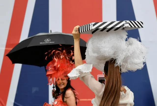 Racegoers attend day one of Royal Ascot at Ascot Racecourse on June 18, 2019 in Ascot, England. (Photo by Toby Melville/Reuters)